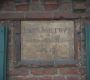 5  plaque on front wall