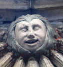 6  head with garland - west porch - early 15th century