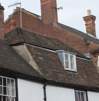tile mansard roof with one central dormer - at 80 Broad Street