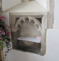 An unusual double piscina (two drainage holes) – St Peter's C of E church