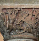 2  grotesques play musical instruments