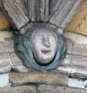 5  head with garland - west porch - early 15th century