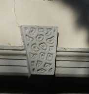 Vermiculated keystone above a window in Bridge Hill House