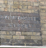 Wall writing – fading early version of Northgate Street
