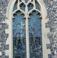 Curvilinear tracery (with mouchettes) in St Mildred's church