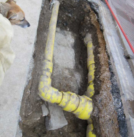 Roman theatre stage temporarily exposed in Castle Street for gas pipe repairs