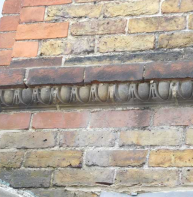 Egg and dart moulding in Pound Lane (near car park entrance)