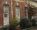 2  shallow-arched windows