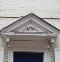an oddity - two pediments (one open pedimented) one within the other
