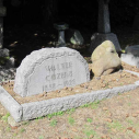 sarsen stone on grave of Walter Cozens