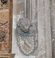 label stop with Sudbury arms (Talbot dog) near north door to nave