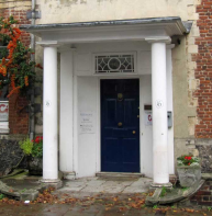 door portico with Tuscan columns