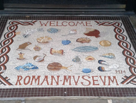 Mosaic – entrance to Roman Museum, Butchery Lane