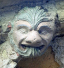11 greenery spewing from mouth  - west porch - early 15th century