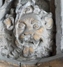 15    lion with wavy surround and tongue - south west porch - 1420s