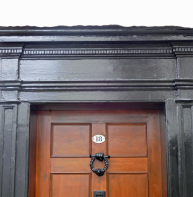 18 Best Lane, door cornice with modillion frieze - note pilasters either side