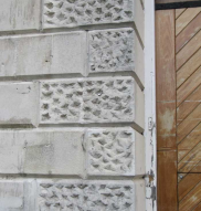 'Vermiculated' finish to the door surround of Canterbury Prison