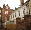 10  former Biggleston home on right