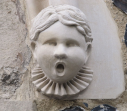 3  chorister's head to right of front door