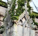 7 "Moss-masked" grotesques on nave's north-aisle buttresses