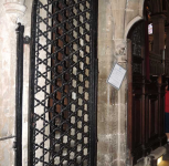 8  left hand gate at entry to choir through pulpitum screen - around 1310