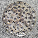 from York (Adams Ltd) - in Mill Lane - a manhole cover