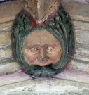 7   man with greenery from mouth - west cloister south walk - early 15th century