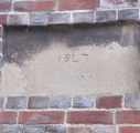 6  date stone on front
